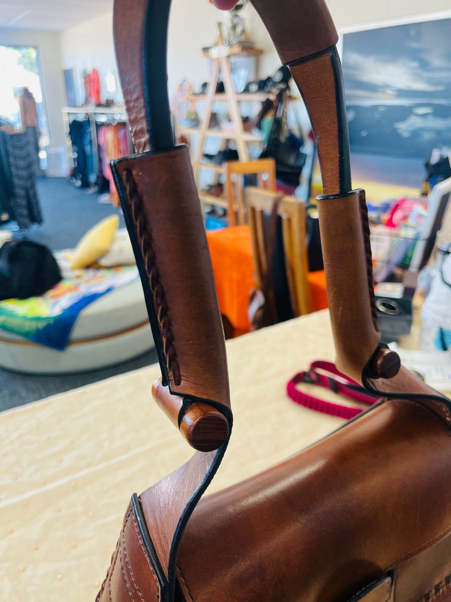 Close-up of a brown leather boot with decorative elements