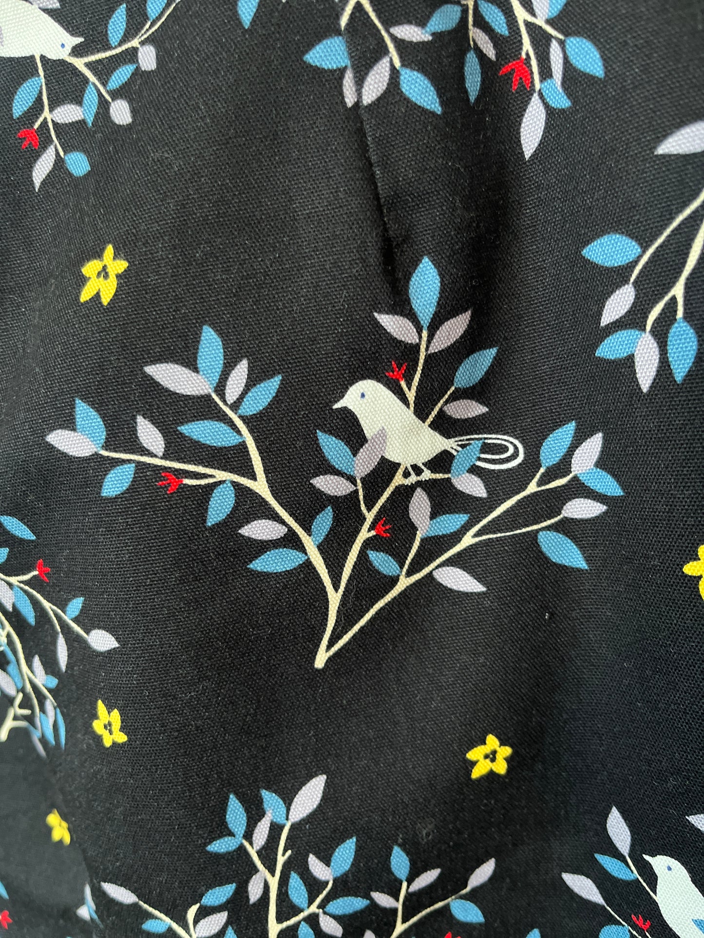 Fabric with bird and branch pattern