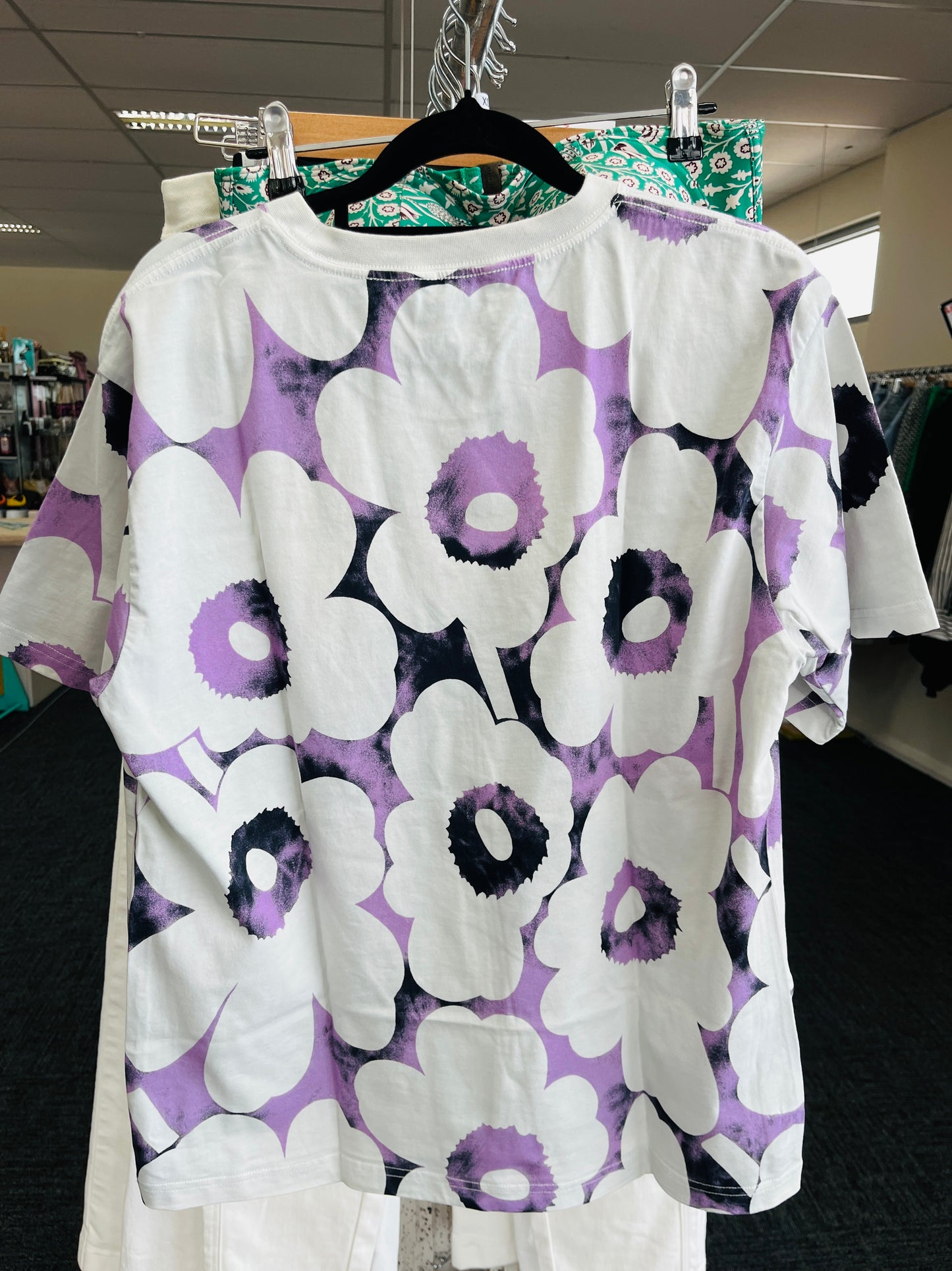 Floral patterned shirt with purple and white flowers