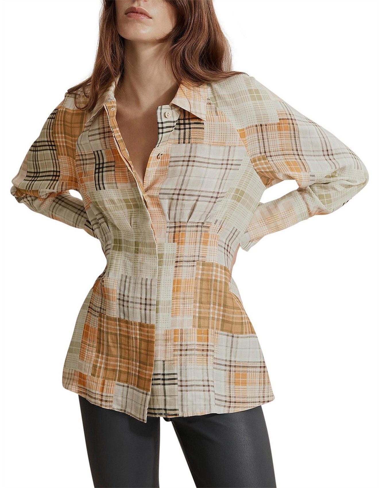 Woman wearing a plaid shirt