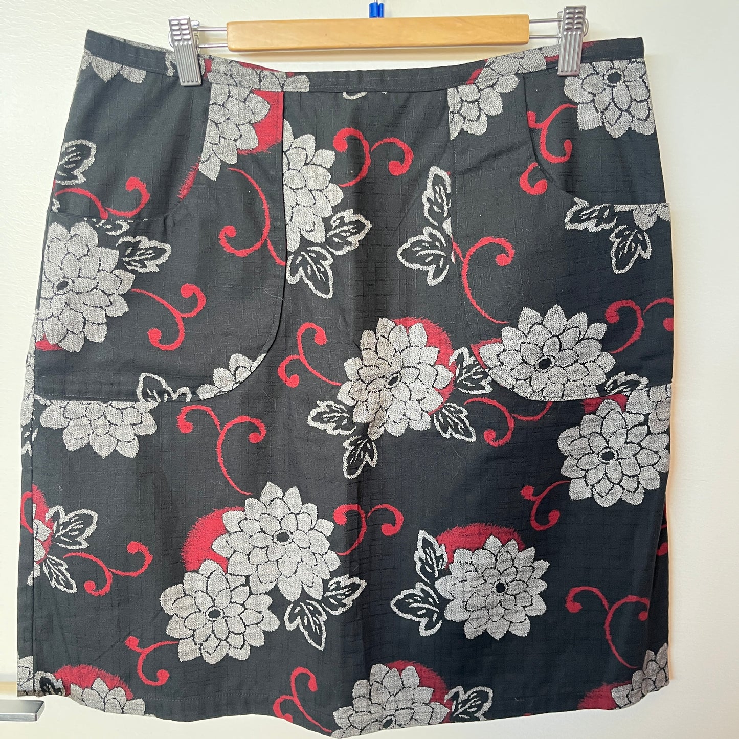 Floral patterned skirt on a hanger