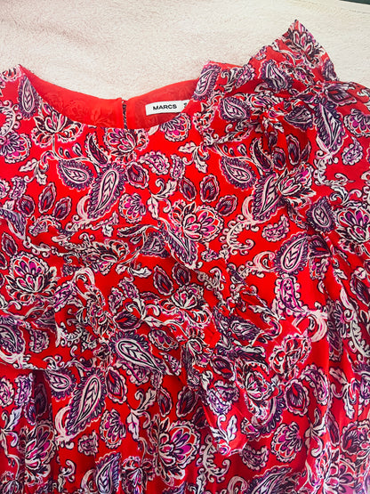 Red garment with purple paisley pattern