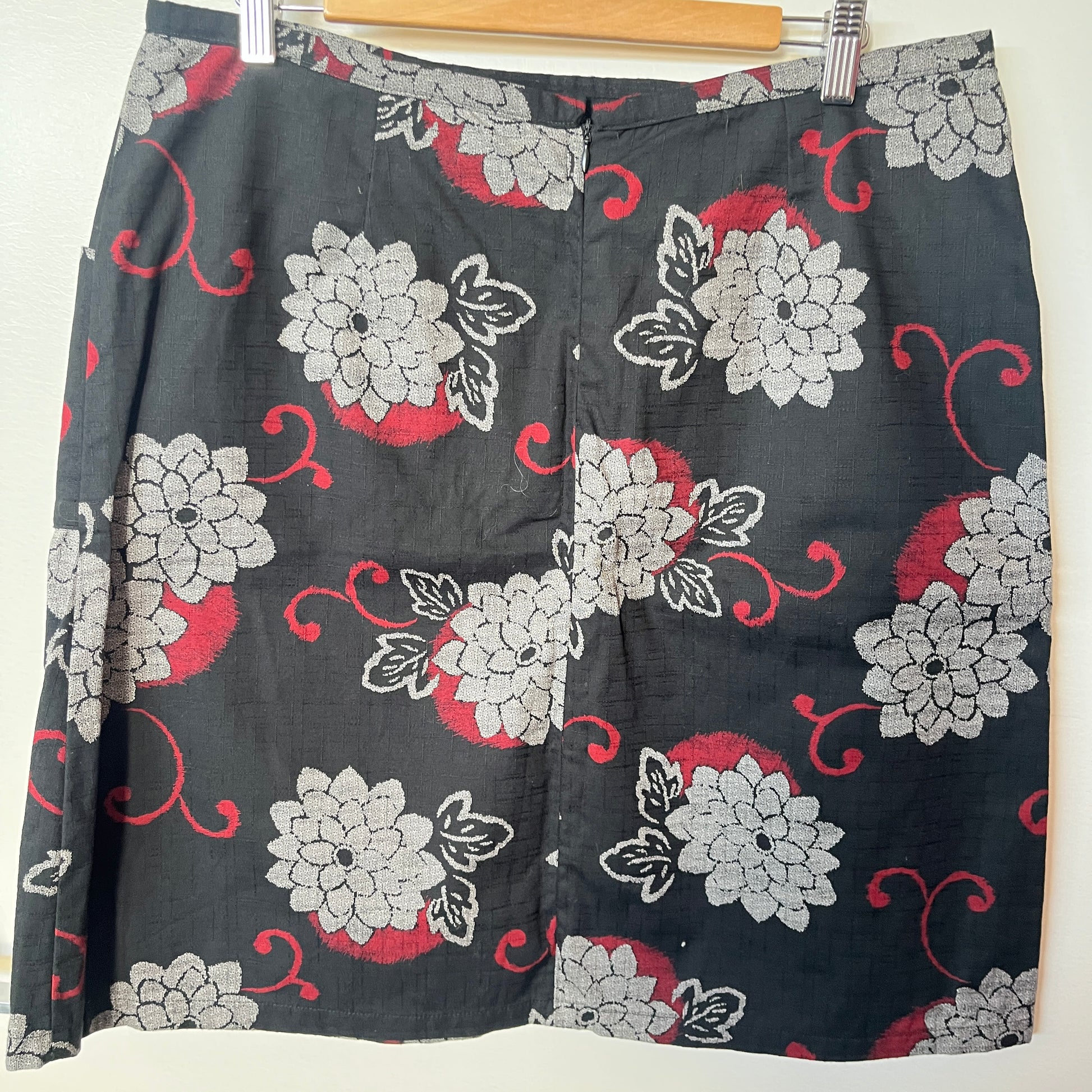 Floral patterned skirt on a hanger