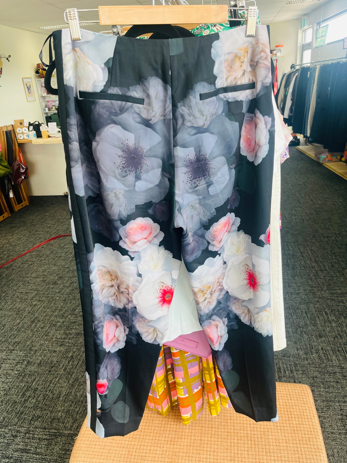 Floral-patterned garment on a hanger