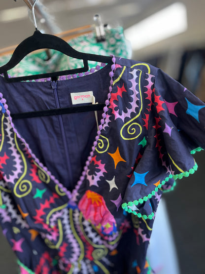 Colorful patterned garment on a hanger