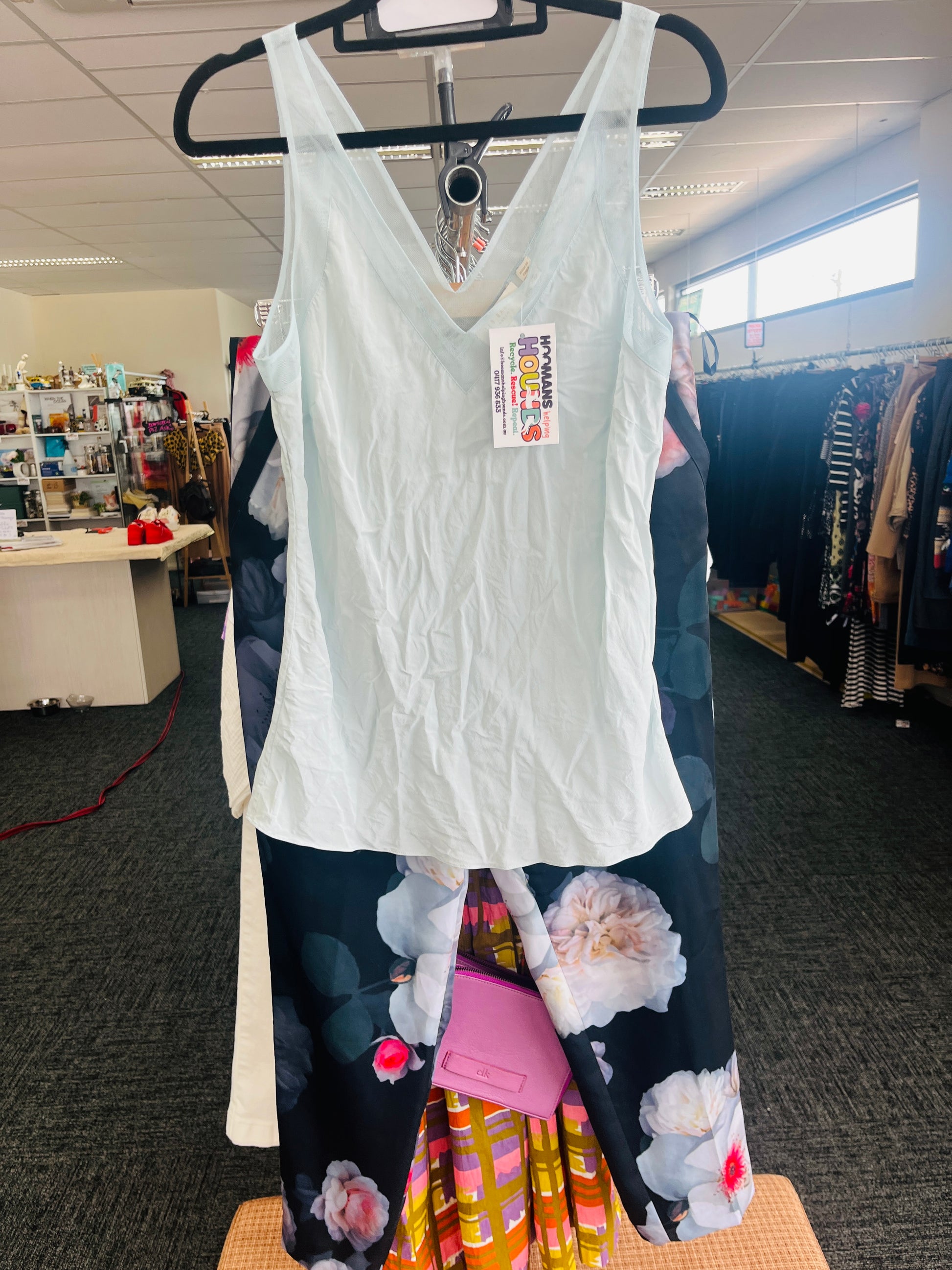 White tank top with a tag