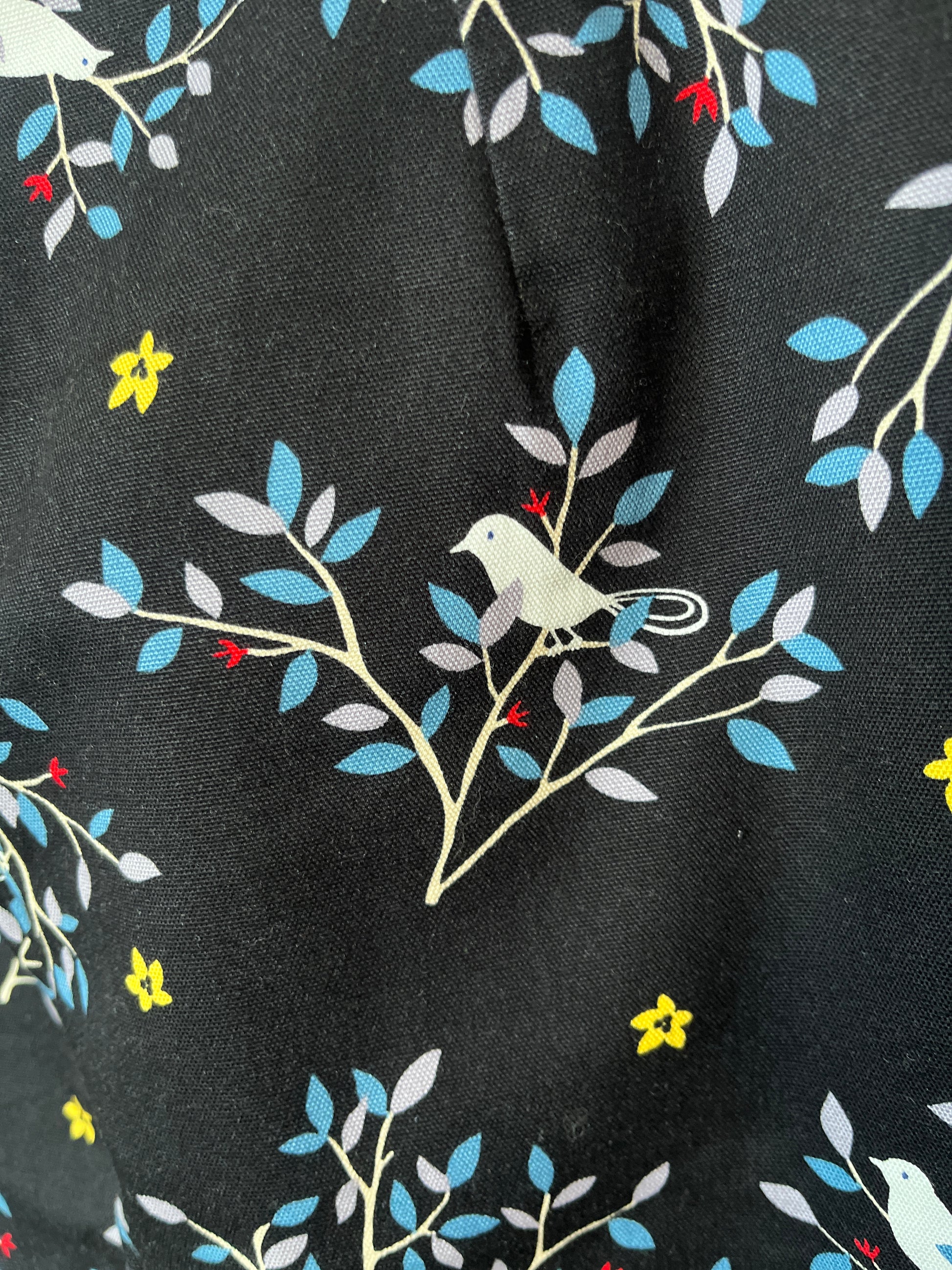 Fabric with bird and branch pattern