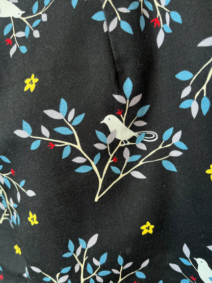 Fabric with bird and branch pattern