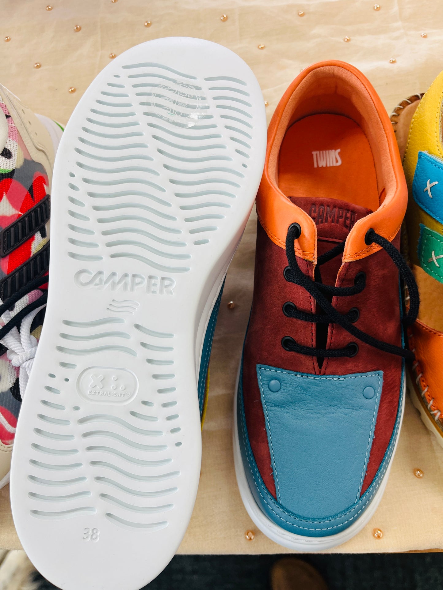 Colorful sneakers with a focus on the white sole