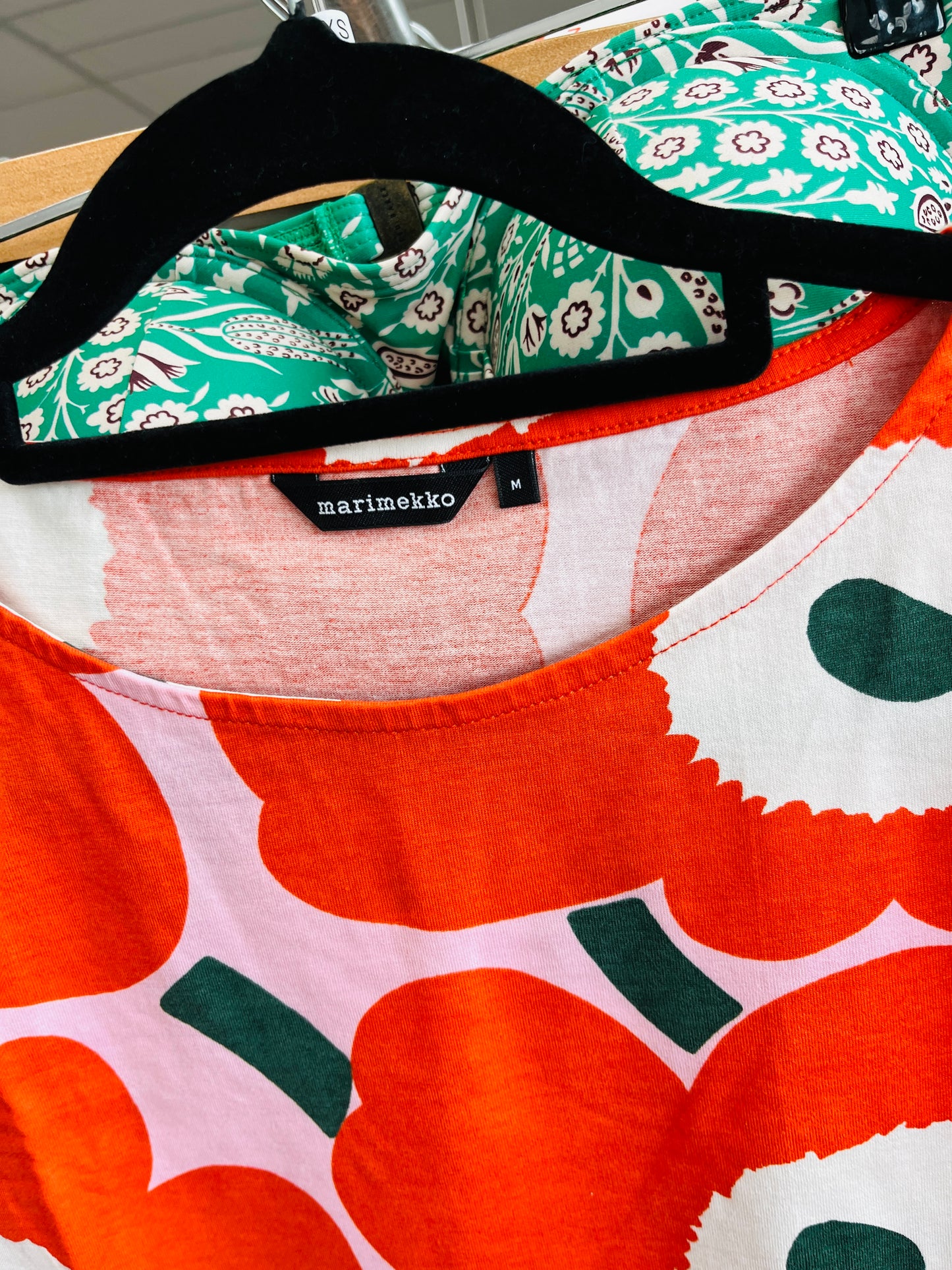 Marimekko garment with floral and abstract patterns