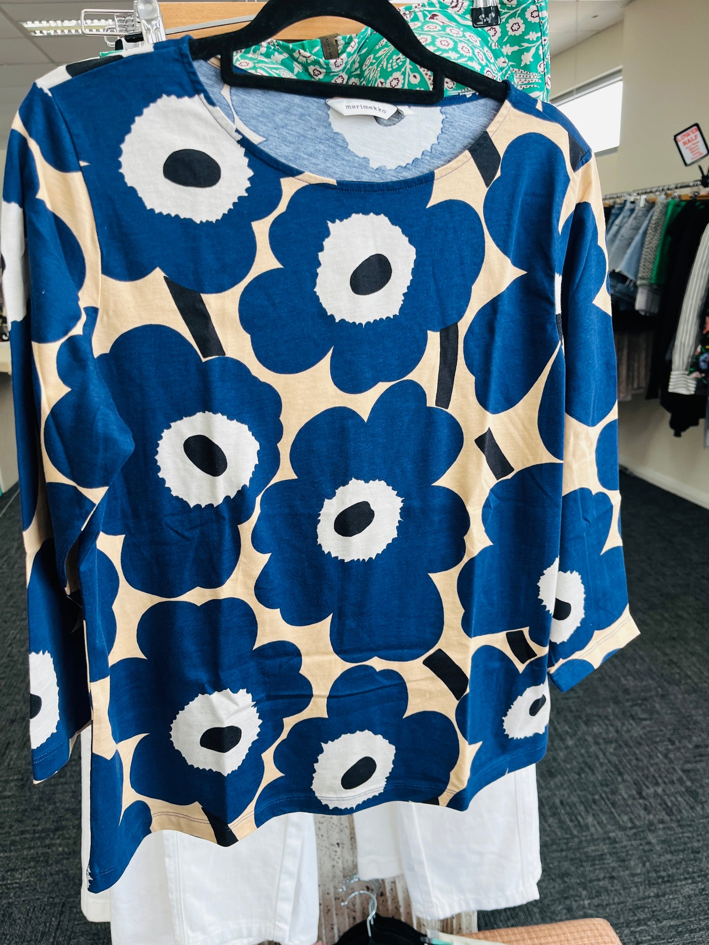 Blue and white floral patterned sweater