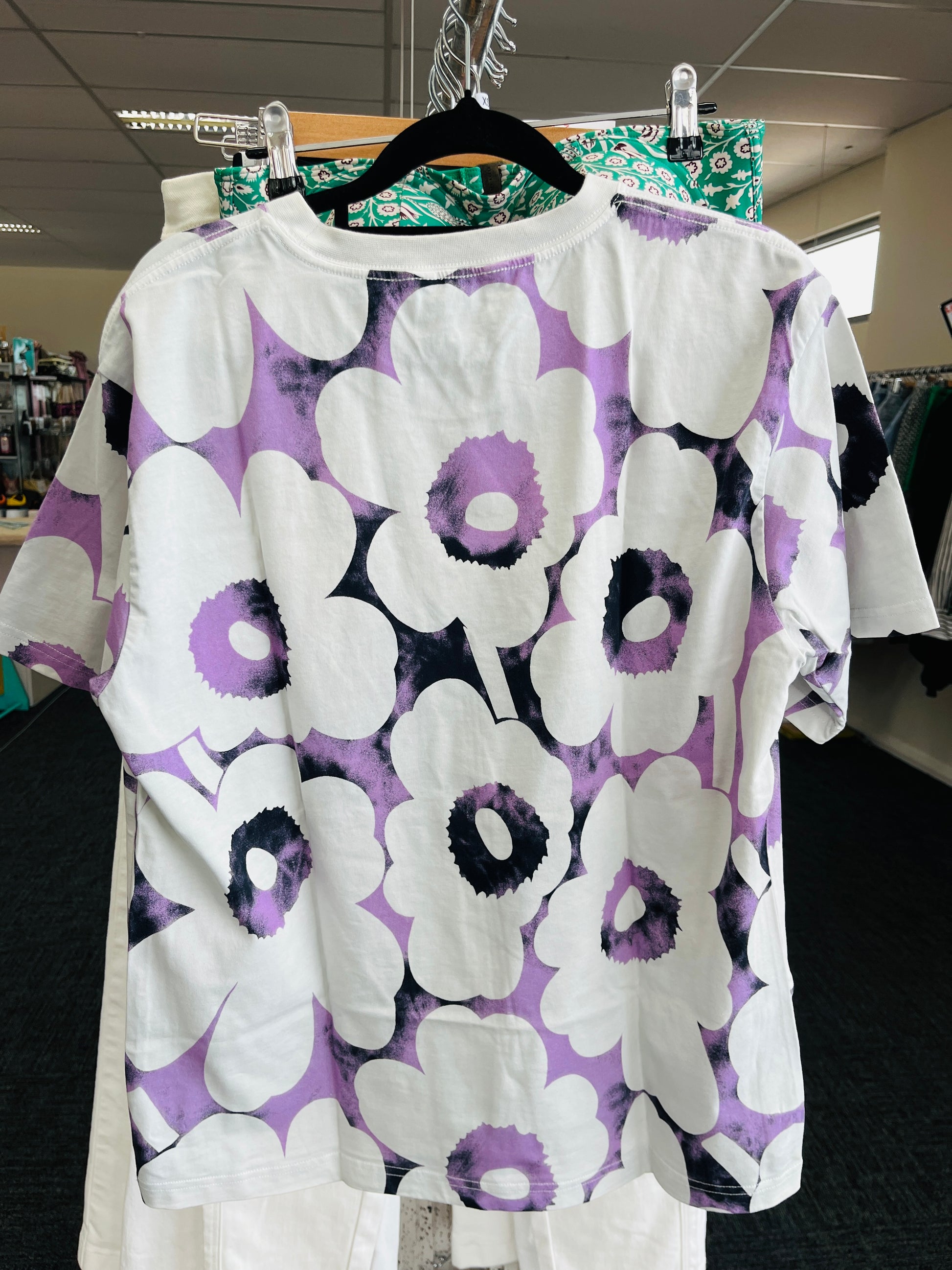Floral patterned shirt with purple and white flowers
