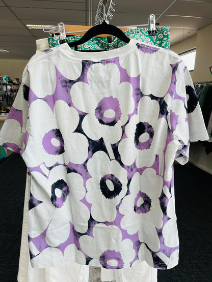 Floral patterned shirt with purple and white flowers